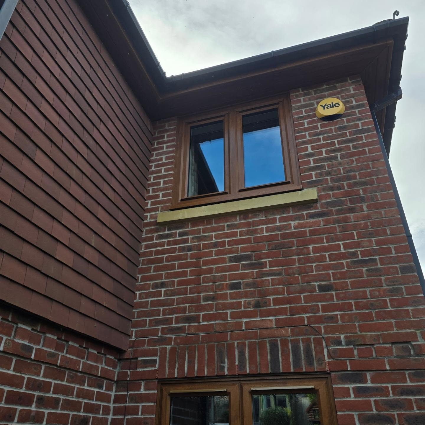 Exterior house cleaning and guttering